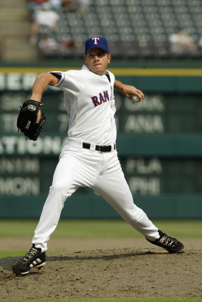 ARLINGTON, TEXAS - SEPTEMBER 12: Pitcher C.J. Nitkowski #50 of the Texas Rangers throws a pitch during the MLB game against the Seattle Mariners on September 12, 2002 at the Ballpark in Arlington, Texas. The Rangers defeated the Mariners 7-3. (Photo by Ronald Martinez/Getty Images)